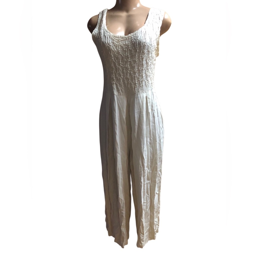 Express compagnie International Sleeveless Cream Jumpsuit with Textured Bodice